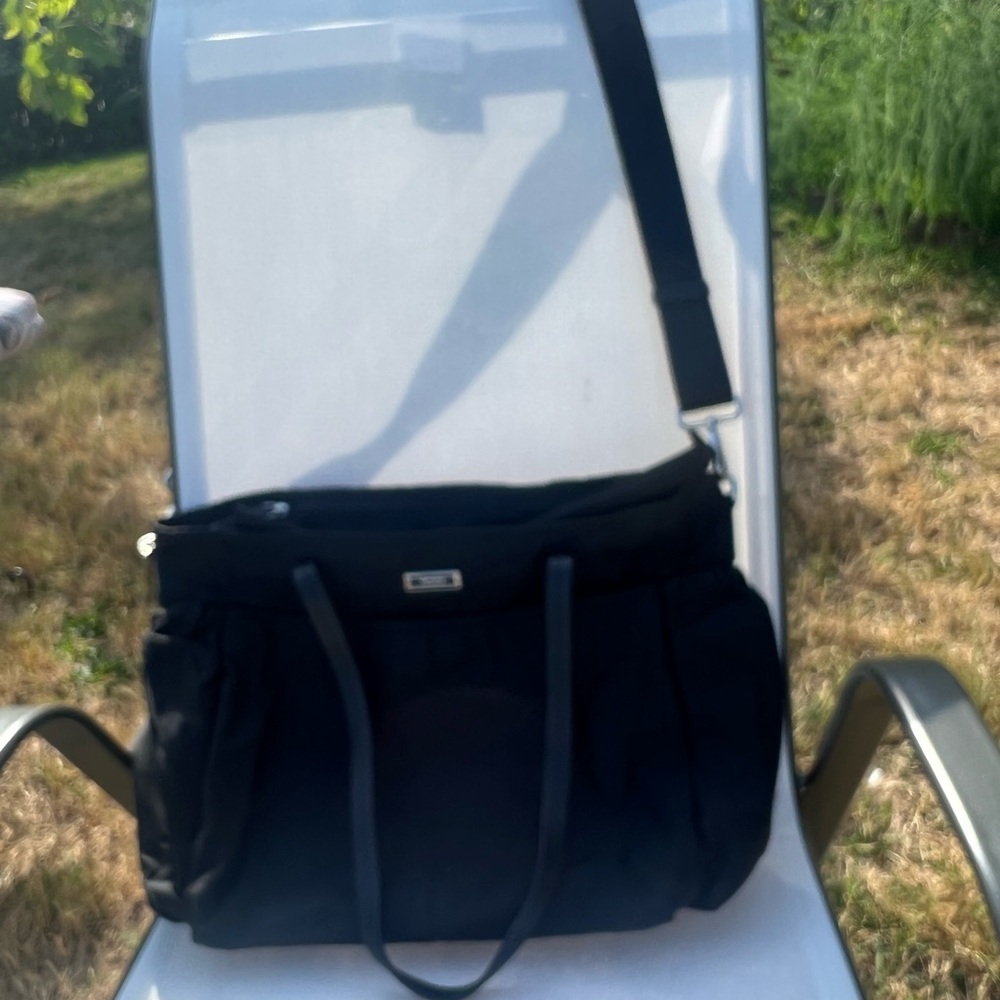 Tumi diaper bag black in excellent condition